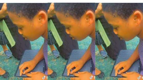 "God is powerful": Little girl totally blind, reads and writes in front of people, video goes viral on TikTok