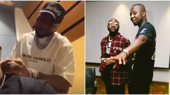Baddest OBO: Davido splashes a whopping over N16m on diamond necklace for loyal aide Santusgee