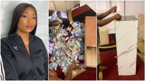 Lady who saved in piggy bank for 10 months breaks big wooden box, counts many naira notes