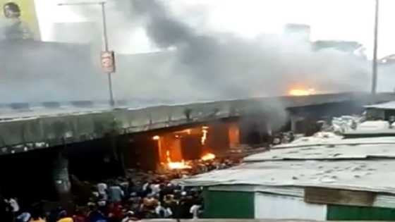 Breaking: Videos emerge as fire outbreak erupts under famous bridge in Lagos