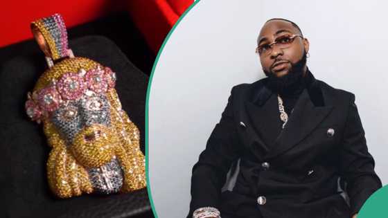 Davido splashes millions of naira on Jesus pendant, flaunts it during Timeless concert at O2 Arena