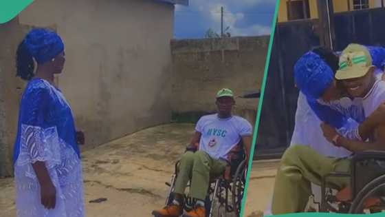 Nigerian graduate on wheelchair salutes his mother emotionally, hugs her