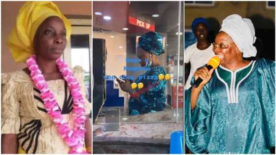 Viral video captures Mummy G.O pressing phone & using earpiece, Nigerians express mixed reactions