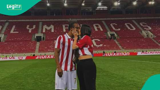 Adorable moment Super Eagles star took lover onto pitch after winning Super League title