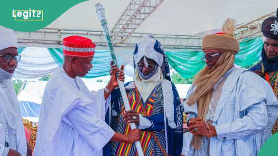 Kano Emirate tussle: Gov Yusuf presents staff of office to reinstated Emir, photos trend