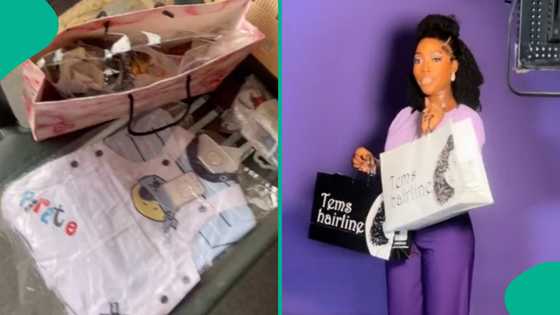 Young lady gives her rider baby clothes and gifts for his wife who recently put to bed