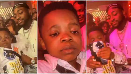 Davido makes grown man shed tears in viral video after taking photo with him