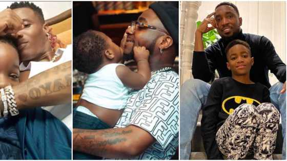 Daddy's boys: Beautiful photos of Wizkid, Davido, Olamide, and 5 others with their adorable sons
