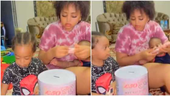 "See money wey we dey find": Regina Daniels fills her children's piggy banks with new naira notes