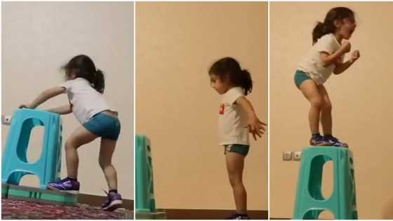 He refused to give up: Inspirational video shows fine moment boy jumped onto a high stool, standing steady