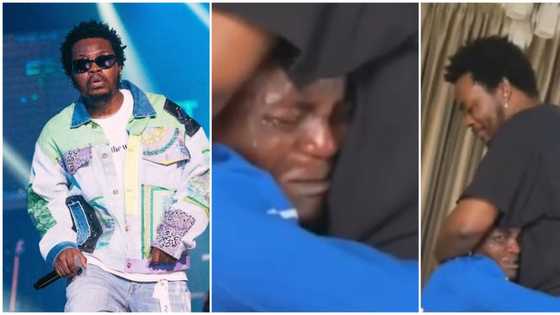 Olamide makes upcoming star cry profusely in emotional video as young man refuses to let rapper go