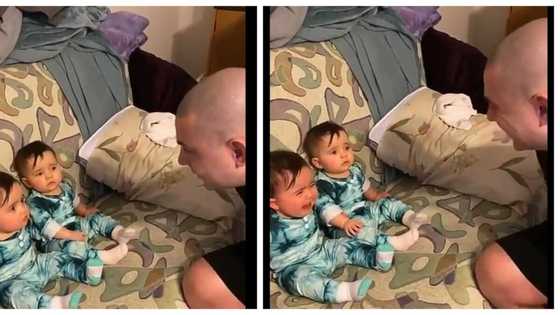 Twin babies light up the internet with their reactions on seeing their father's shaved head