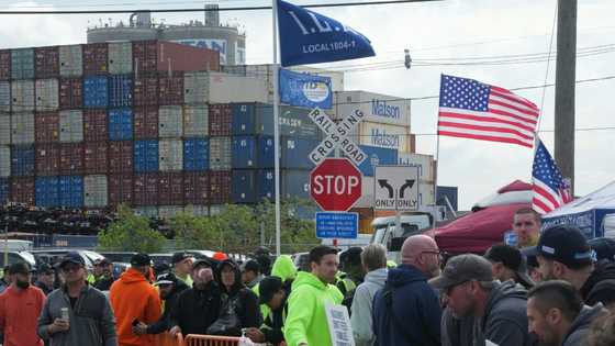 Cranes stand still as US dockworkers fight for 'future'