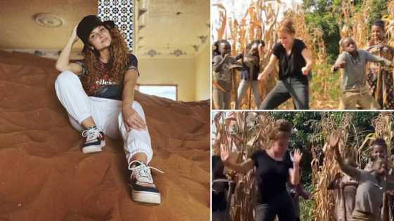 Beautiful Oyinbo lady dances hard and fast with little orphan boy, viral video gets people gushing