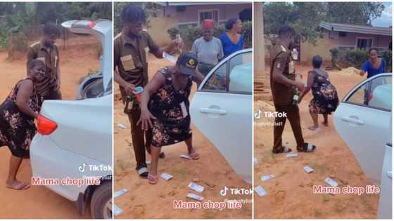 "Mama chop life": Man appreciates his mum for suffering for them in the absence of their dad, sprays her cash