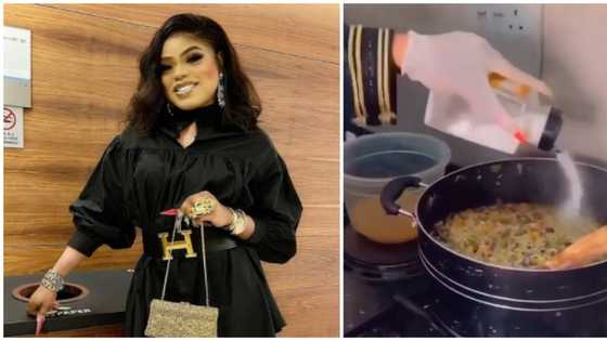 Nigerians react to viral video of Bobrisky adding 'little salt' to food