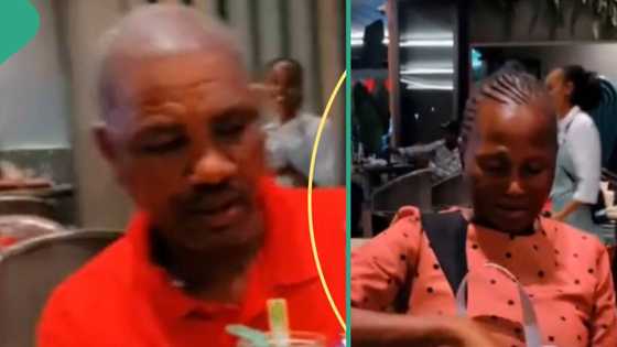 Parents receive new phones from their daughter at restaurant and their reactions are priceless