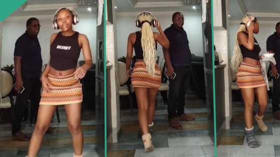 Lady places camera in dad's parlour, dances in mini skirt, father walks in, "stops" her