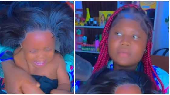 Video of baby in tears after being made to wear lace frontal wig: "What happened to two shuku?"