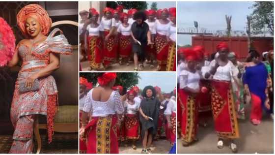 Rita Dominic received into husband's family compound by a group of women like a queen in cute video