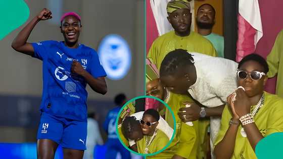 Asisat Oshoala's reaction after male colleague kissed her at party generates buzz: "No be by force"