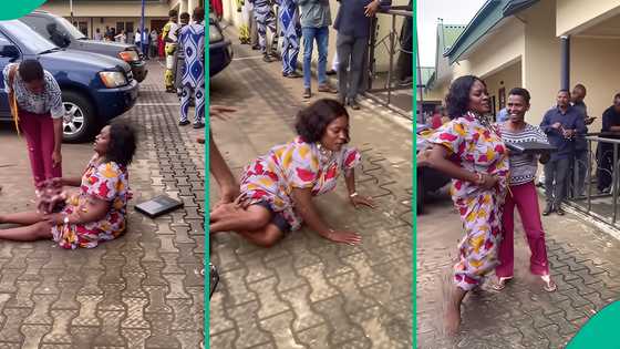 Lady rolls on floor as she receives appointment letter for dream job 18 years after graduation