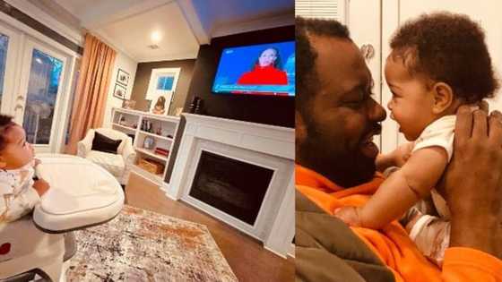 Baby sees her mother on TV for first time, photo captures emotional moment