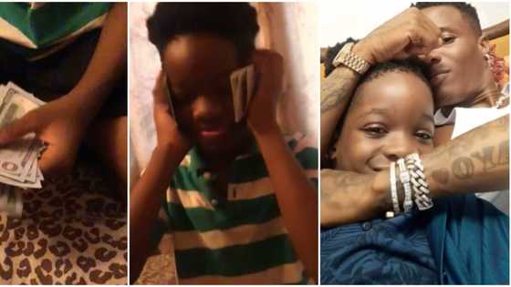 I only speak in foreign currency: Wizkid's 1st son Tife proudly flaunts dollars after hanging out with singer