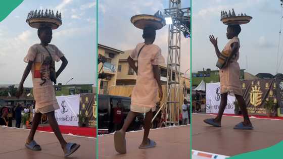 Nigerian girl selling groundnut joins fashion parade with tray on her head, video thrills netizens
