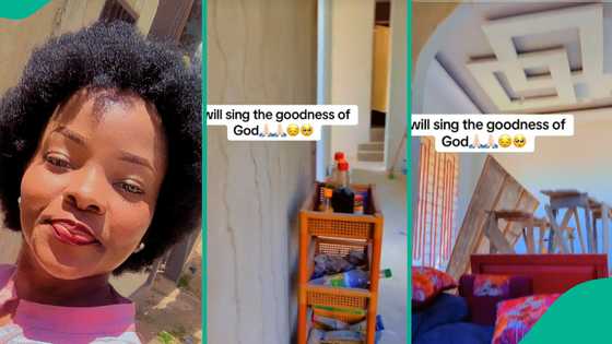 Lady rejoices as she moves into her house even though the building is still uncompleted