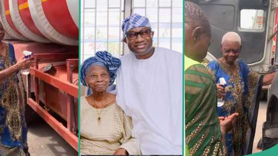 Femi Otedola’s mum sprays holy water on son’s trucks, prays for drivers: “You’ll also buy your own”