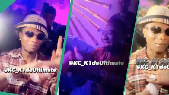 “2 kings”: Wizkid holds KWAM 1’s hands as they dance together in heartwarming video, fans gush