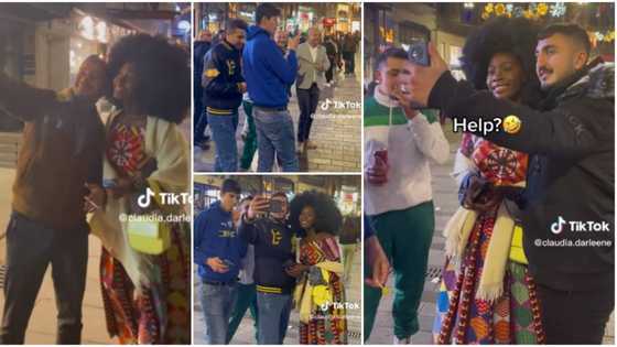 "Don't blame them": Cute video as Oyinbos line up to take pictures with fine black lady with natural afro