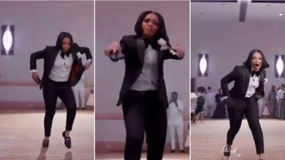 She's on fire: Groom's lady in beautiful black suit dances like robot at reception, stunning video goes viral