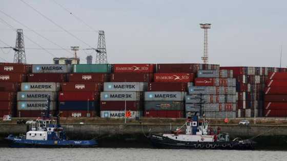 US exports hit new record in June, lowering trade deficit