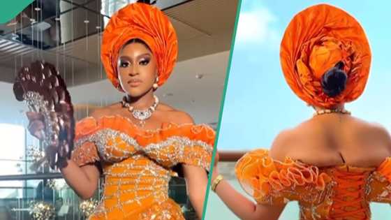 Deby Oscar wears tight wedding gown, pushes up her back skin, displeases netizens: "This isn't good"