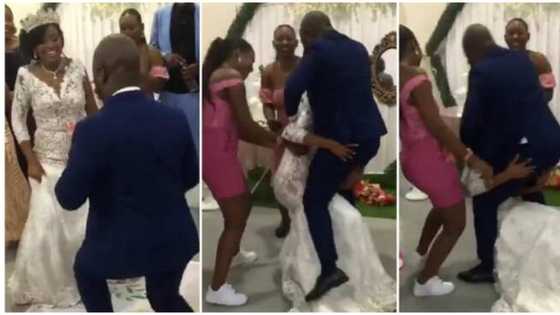 "When you were calling him baby": Video emerges as groom jumps on bride, tumbles her to the ground at wedding