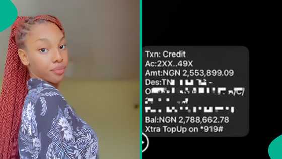 Lady displays N2.5 million "random person" sent to her UBA account for being pretty