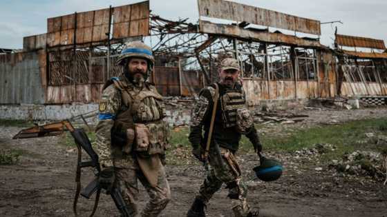 Civilians lie slain as Russian troops flee Ukraine push