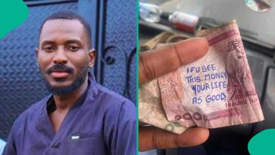 Nigerian man shares what was written on N200 note he collected from conduct, photo trends online