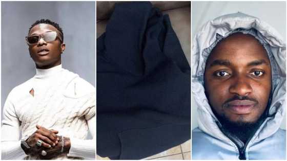 Young man who caught Wizkid's sweater during his Lagos concert wants to sell it for N620k, Nigerians react