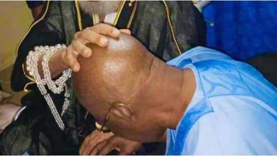 2023: Viral photo as Tinubu goes on his knees while powerful Imam lays hand on his head