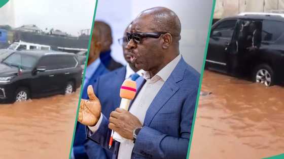 "Everybody don collect now": Video shows Nigerian governor's convoy stranded as flood overruns major road