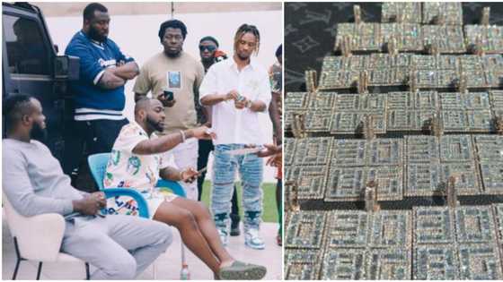 "This money is too much": Huge surprise as Davido splashes millions on 23 diamond pendants for 30BG members
