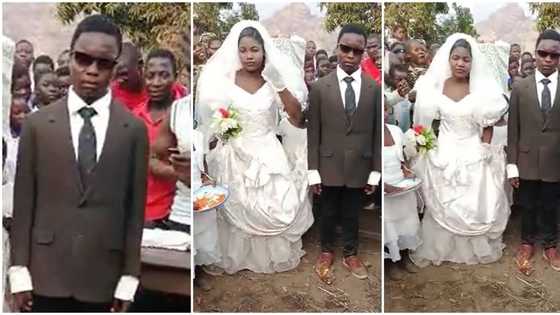 "What is going on?" People confused as groom stands motionless, watches bride scatter dance in wedding video