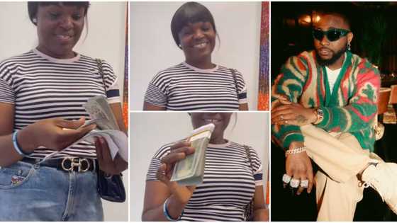 Video as Davido finally fulfills promise to hotel worker, she shows off $10,000 cash she received from singer