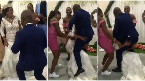 Excited groom jumps on wife during wedding, forcefully yanks her to the ground in hair-raising video