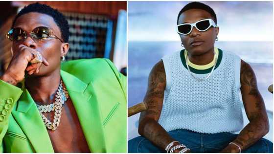"Na Big Wiz them push like that": Reactions trail trending video of Wizkid carrying a lady at sea