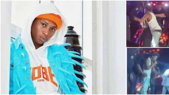 "Later dem go say bouncer harsh": Reactions as overzealous fan makes Bella Shmurda fall off the stage