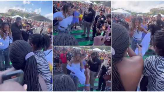 Sweet video as Asake removes cloth, gives it to female fan who impressed him at his show: “She made him happy”